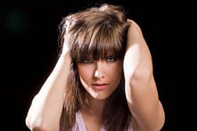 woman touching hair