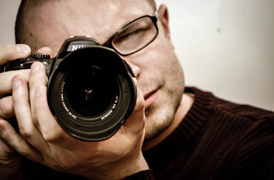 man holding camera